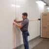 Super Strap tape to wall