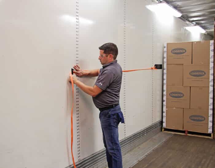 Super Strap tape to wall